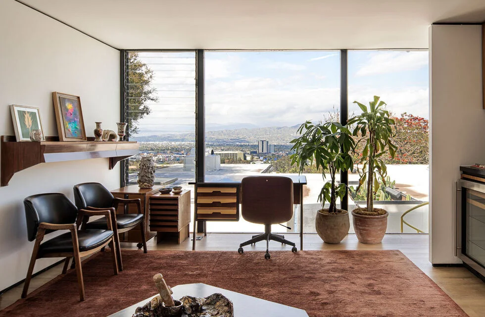 The study in the guest house, the city through the glass.