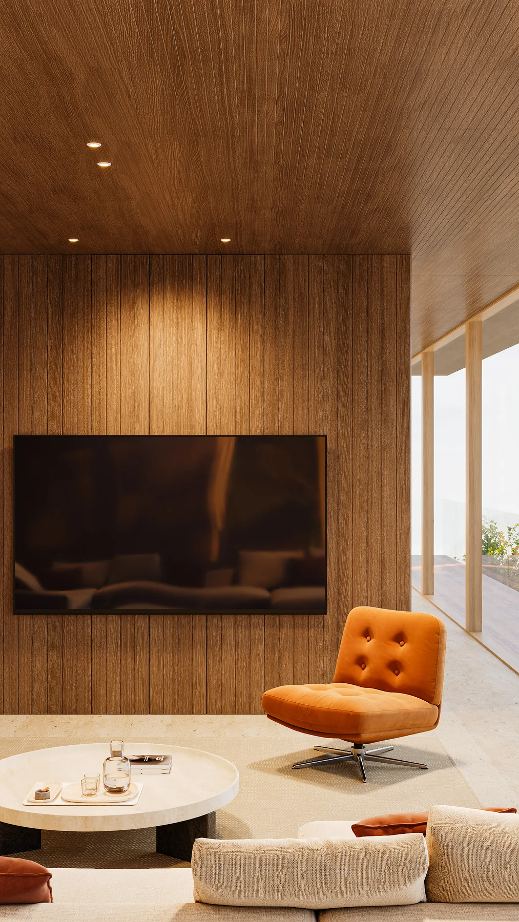 A lounge by day, its television wall and glass to the terrace.