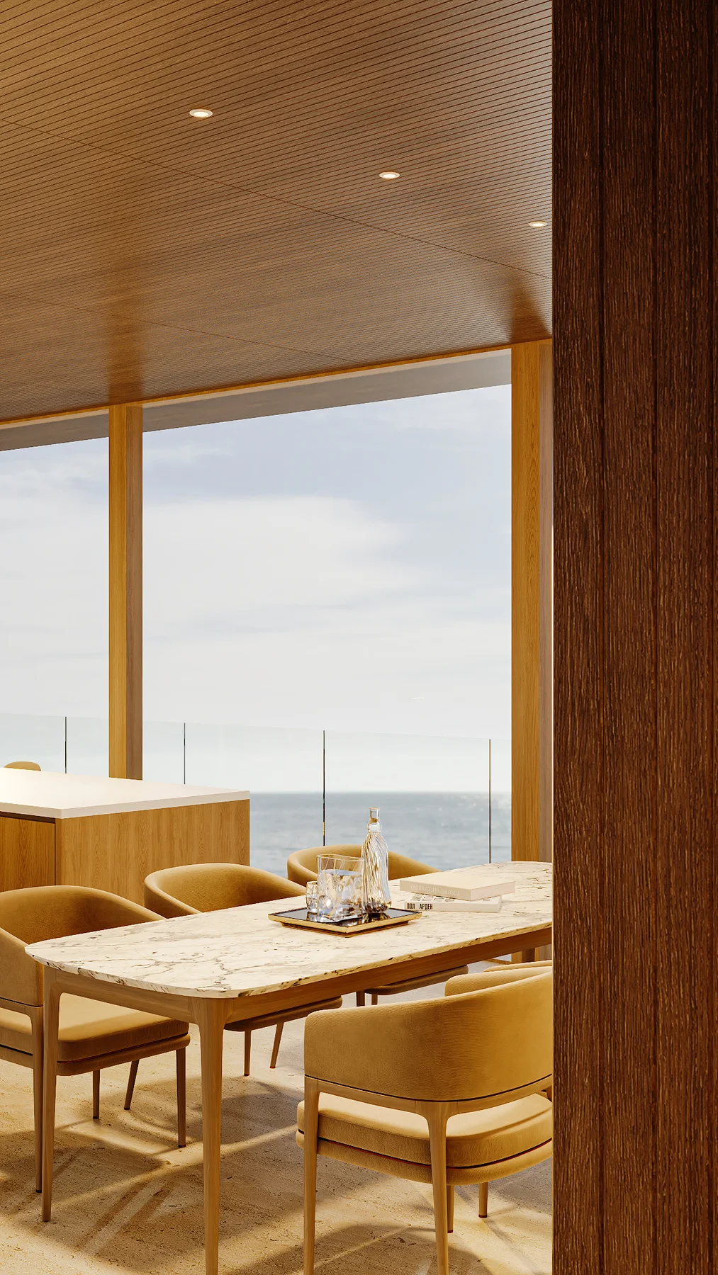 The dining table by day, set for a family, the kitchen island behind it.